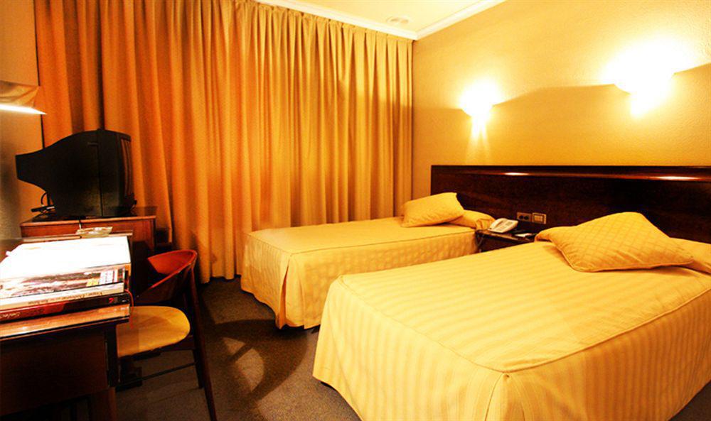 Occidental Vigo Hotell Rum bild